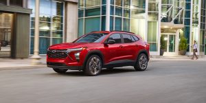 New 2026 Chevrolet Trax cruising in city